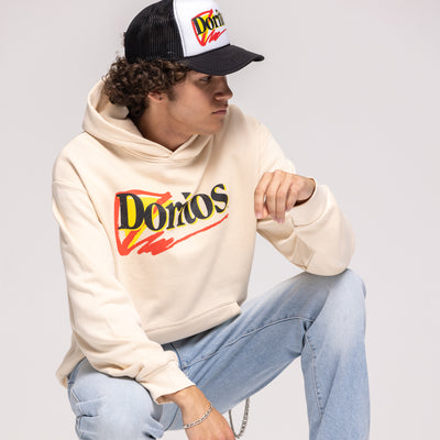 Cream pullover hoodie with red, yellow, and black 