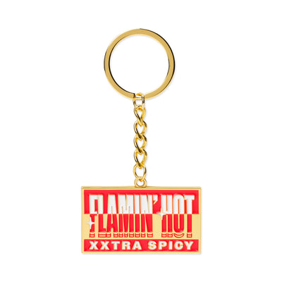 Gold metal keychain with red rectangular 