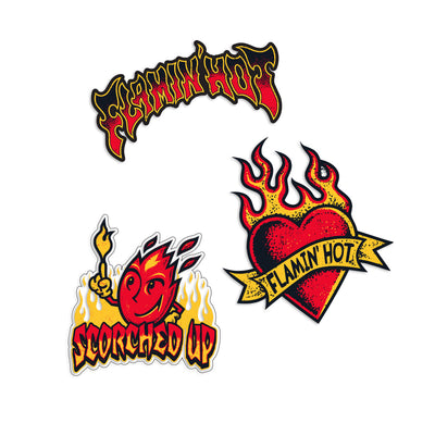 Three Flamin' Hot stickers: red and black flame lettering logo, 