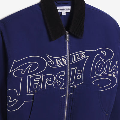Detail of the black corduroy collar, silver zipper and Pepsi-Cola script embroidery